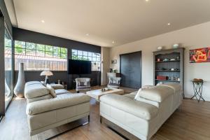 Villas Superbe maison climatisee avec piscine : photos des chambres