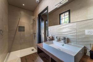 Villas Superbe maison climatisee avec piscine : photos des chambres