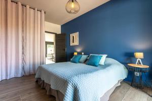 Villas Superbe maison climatisee avec piscine : photos des chambres