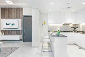 Modern 2BR with Private Pool at Samana Golf Avenue Studio City by Vibel
