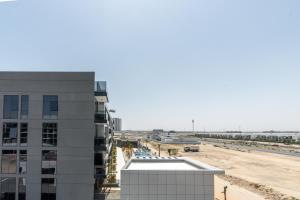 Modern 2BR with Private Pool at Samana Golf Avenue Studio City by Vibel