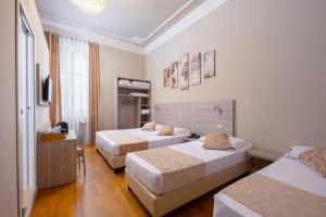 Quadruple Room room in Lilium Hotel