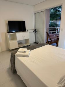 Casa charmosa condomínio piscina Praia de Juquehy, São Sebastião