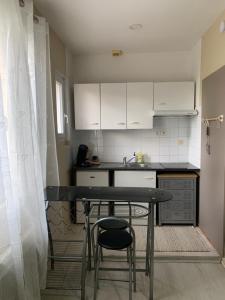 Appartements Studio proche auditorium et centre-ville : photos des chambres