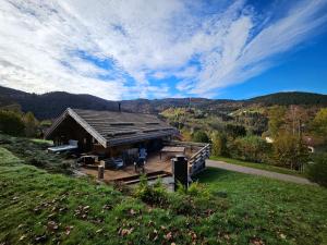 Chalets Chalet ''la cabane o Pierres'' 12 pers spa et sauna : photos des chambres