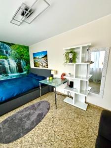 Magisches Doppelzimmer mit atemberaubender Wasserfall-Wand in Seligenstadt