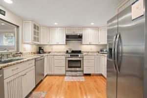 Located on Rail Trail By Beach & Downtown