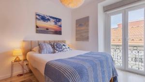 Sunny Design Apt in Praça das Flores by LovelyStay