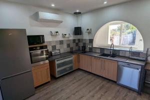 Maisons de vacances #Maison chaleureuse sur les hauteurs d-Aubiac# : photos des chambres