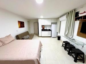 Casa de Praia com Piscina e Churrasqueira a 280m da Praia do Morro - 3 quartos com Ar Condicionado, sendo 2 suítes- Quintal amplo, ideal para famílias