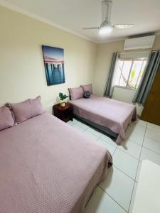 Casa de Praia com Piscina e Churrasqueira a 280m da Praia do Morro - 3 quartos com Ar Condicionado, sendo 2 suítes- Quintal amplo, ideal para famílias