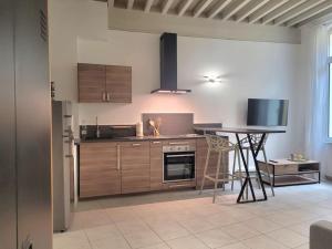 Appartements Appartement Au coeur de l-Isle : photos des chambres