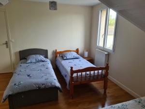 B&B / Chambres d'hotes Chambre au calme et une chambre supplementaire a partir de la 3eme personne : photos des chambres