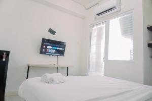 Good Deal and Nice Studio Green Pramuka City Apartment By Travelio