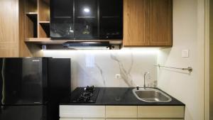 Simple 2BR Connected to Mall at Anderson Supermall Mansion Apartment By Travelio