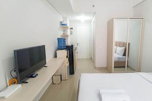 Modern Studio at Barsa City Apartment By Travelio