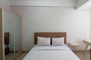 Modern Studio at Barsa City Apartment By Travelio