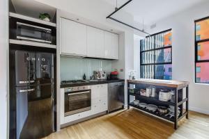 The Iron Loft on Collins - Heritage Industrial Charm