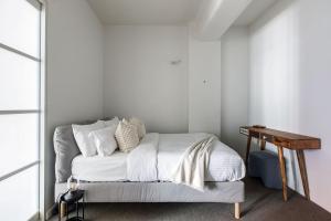 The Iron Loft on Collins - Heritage Industrial Charm