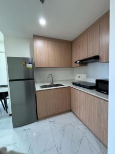 Sunny Place Condo Unit 2 BR Paranaque Near Airport, MOA, Okada