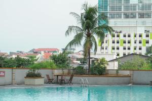 Cozy Style Studio Margonda Residence 2 Apartment By Travelio