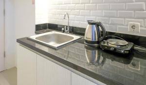 Clean Studio with Connected to Mall at Orchard Supermall Mansion Apartment By Travelio