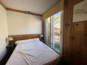Résidence Rochail - Duplex chaleureux en centre station avec vue sur les pistes MAE-5311