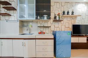 Nice Studio at 18th Floor Atria Residence Gading Serpong Apartment By Travelio