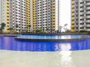 Fancy and Comfy 2BR Apartment at Springlake Summarecon By Travelio