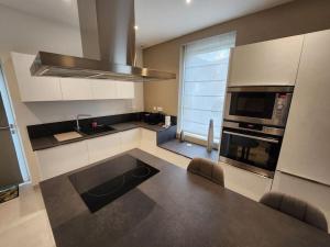 Appartements T4 duplex neuf parking - Aeroport-Eurexpo-Stade : photos des chambres