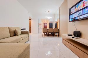 Homey and Spacious 3BR Sky House BSD Apartment By Travelio