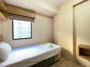 Cozy 3BR Furnished Apartment at Gateway Ahmad Yani Cicadas By Travelio