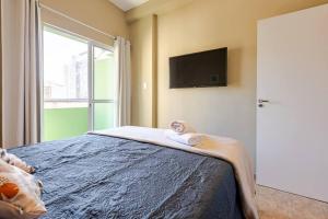 Studio Lapa: quarto e sala com varandinha!