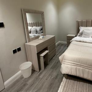 Self-Entry Apartment in Almasif Living Room and Bedroom