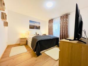 Modern und lichtdurchflutet - Ferienwohnung mit Terrasse