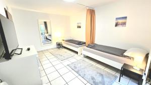 Apartment mit 2 Einzelbetten, Terrasse, Parkplatz, WLAN, voll ausgestattet - Monteurwohnung MF01