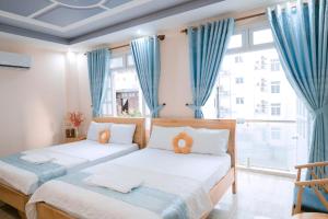Phòng 4 Người Có Ban Công (Quadruple Room with Balcony)