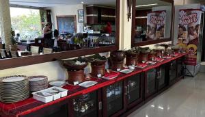 Zoé’s Paradise Waterfront Hotel