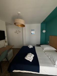Hotels L-Hotel De La Plage : photos des chambres