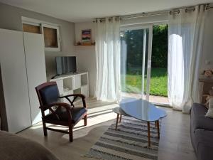 Appartements Appartement au rez-de-chaussee d'une maison : photos des chambres