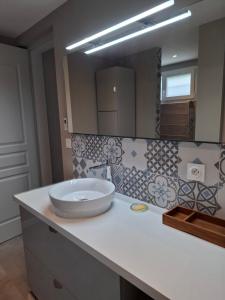 Appartements Appartement au rez-de-chaussee d'une maison : photos des chambres