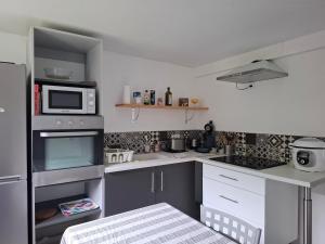 Appartements Appartement au rez-de-chaussee d'une maison : photos des chambres