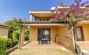Village in Porto Corallo just 200 meters from the beach, apartments with private outdoor area