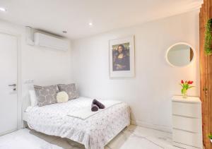 Appartements Evasion Urbaine Studio Cozy avec Terrasse et Parking, a 10 Minutes de Paris Gare du Nord : photos des chambres