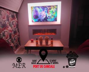 Appartements L'Etoile by MRODBNB - Appart Neuf - Vue Mer - 25m Plage & Resto - Cine - cheminee - Popcorn : Appartement 1 Chambre