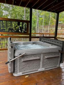 Luxe Cabin with Game Room, Hot Tub & Firepit
