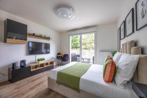 Appartements Studio entre Paris & Disneyland : photos des chambres