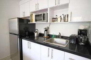 Family Friendly Condo Steps to Miami Beach with Free Parking