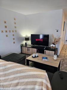 Appartements Villa avec baignoire balneo veranda & jardin : photos des chambres
