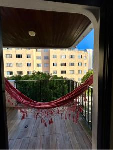 Apartamento aconchegante, frente, 3 dormitórios Região Central - Guarujá